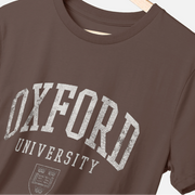 Brown t-shirt with 'Oxford University' print on a hanger